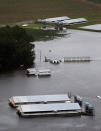 A hog farm is inundated with floodwaters from Hurricane Florence near Trenton, N.C., Sunday, Sept. 16, 2018. (AP Photo/Steve Helber)