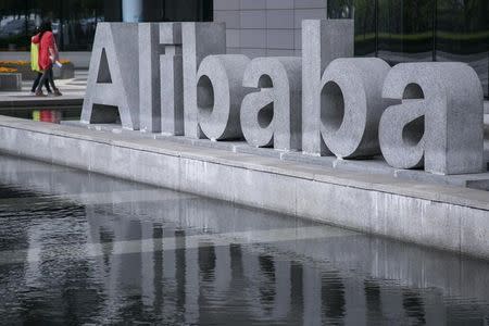 People walk at the headquarters of Alibaba in Hangzhou, Zhejiang province, April 23, 2014. REUTERS/Chance Chan