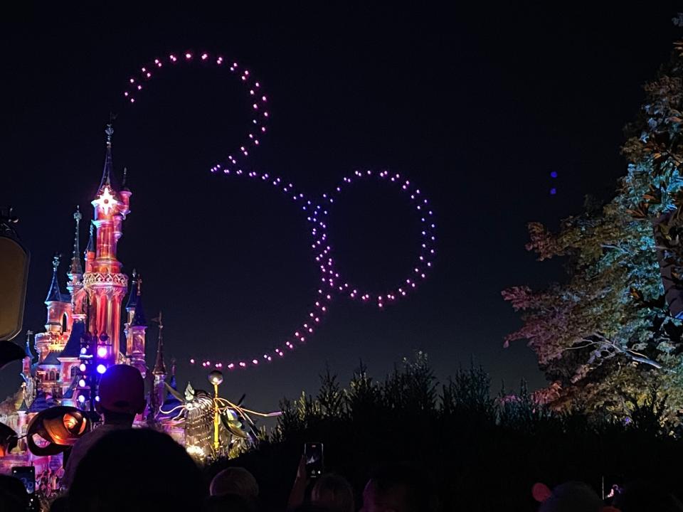 drones making a mickey shape around the castle at disneyland paris