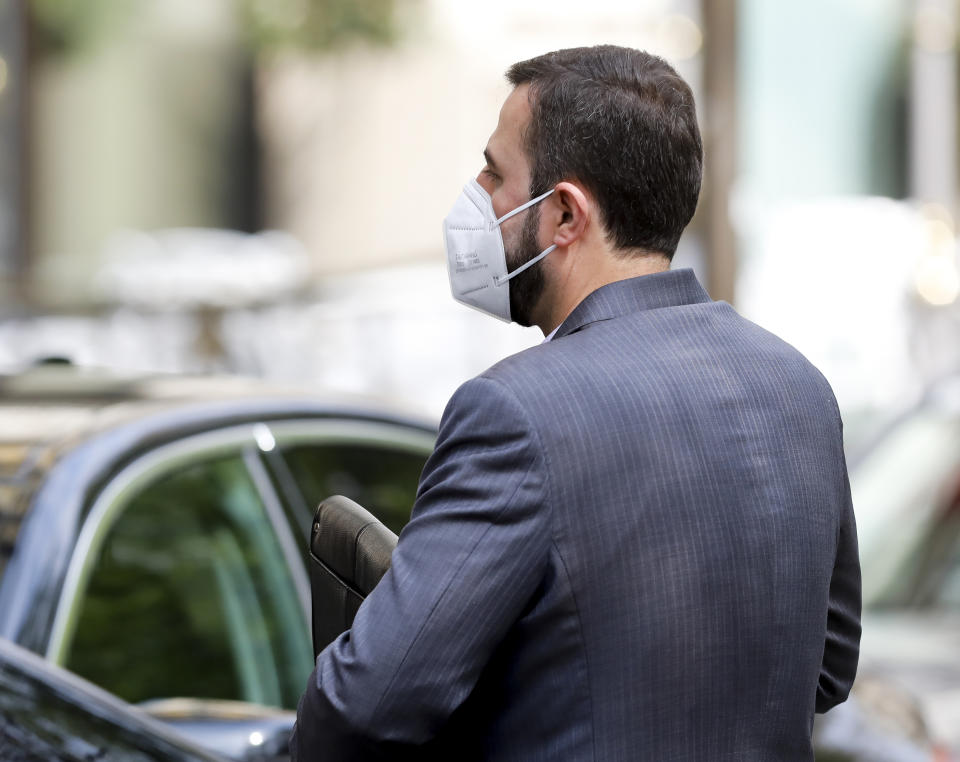 Iran's Governor to the International Atomic Energy Agency (IAEA), Kazem Gharib Abadie enters the 'Grand Hotel Wien' where closed-door nuclear talks take place in Vienna, Austria, Tuesday, April 27, 2021. (AP Photo/Lisa Leutner)