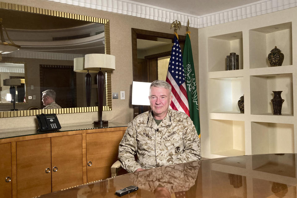 Marine Gen. Frank McKenzie, top U.S. commander for the Middle East, speaks to reporters traveling with him in Riyadh, Saudi Arabia, on Sunday, May 23, 2201. “The Middle East writ broadly is an area of intense competition between the great powers. And I think that as we adjust our posture in the region, Russia and China will be looking very closely to see if a vacuum opens that they can exploit,” he says. (AP Photo/Lolita Baldor)