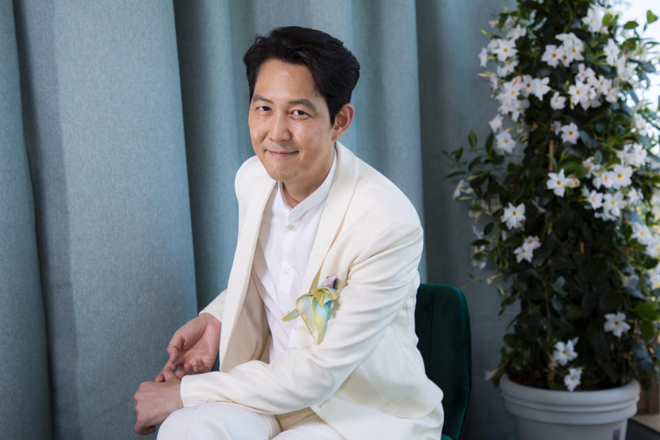 Lee Jung-jae poses for portrait photographs for the film 'Hunt, at the 75th international film festival, Cannes, southern France, Thursday, May 19, 2022. (Photo by Joel Ryan/Invision/AP)