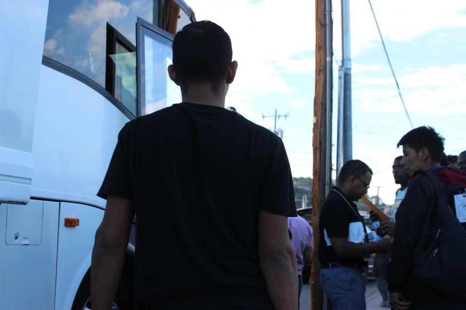 Migrants board a Pima County-funded bus headed for Phoenix after being released by Border Patrol into Nogales on Thursday, September 21, 2023.