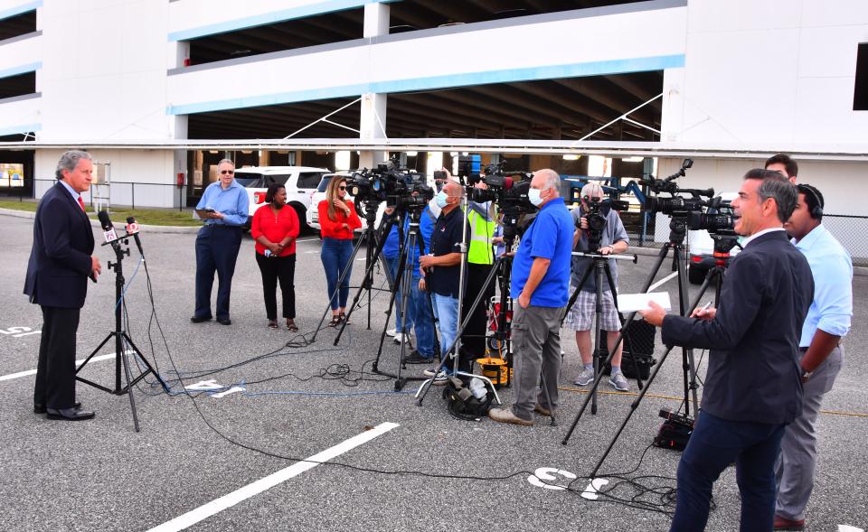 Port Canaveral Chief Executive Officer John Murray gives a COVID-19 update to members of the media outside Cruise Terminal 10.