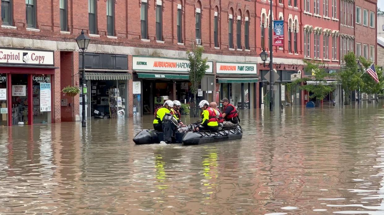 Emergency services work following flooding, in Montpelier, Vermont (Neal P. Goswami via REUTERS)