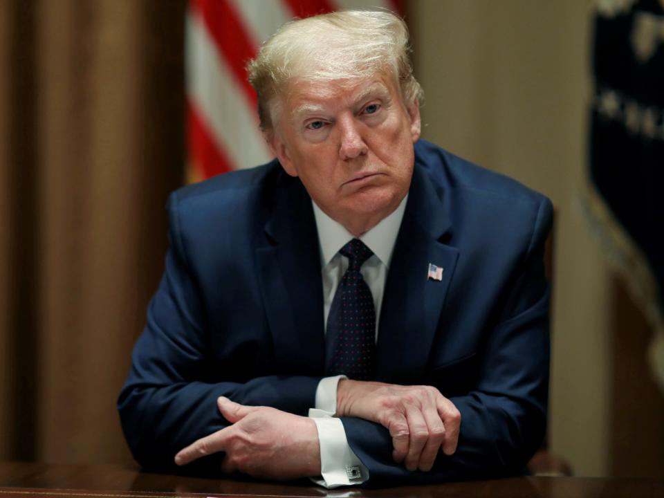 FILE PHOTO: U.S. President Donald Trump holds a meeting on "opportunity zones" in the Cabinet Room of the White House in Washington, U.S., May 18, 2020. REUTERS/Leah Millis/File Photo