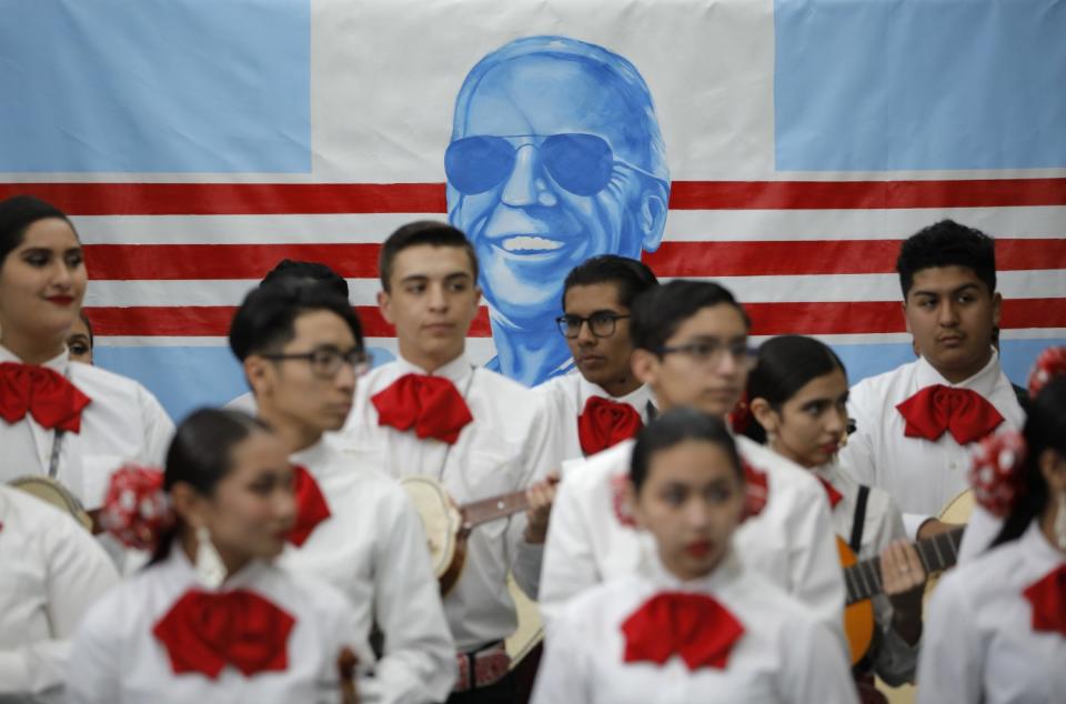 Mariachi band waits to perform before a campaign event for Joe Biden