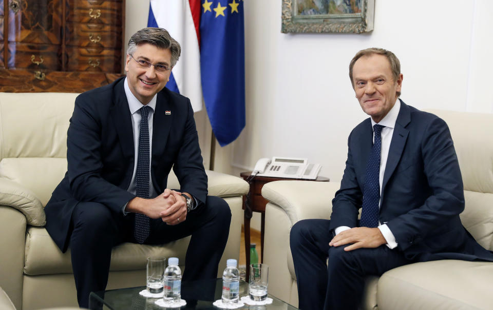 President of the European Council Donald Tusk, right, is welcomed by Croatia's prime minister Andrej Plenkovic in Zagreb, Croatia, Tuesday, Nov. 19, 2019. Donald Tusk attends the European Peoples Party (EPP) congress in Zagreb. (AP Photo/Darko Bandic)