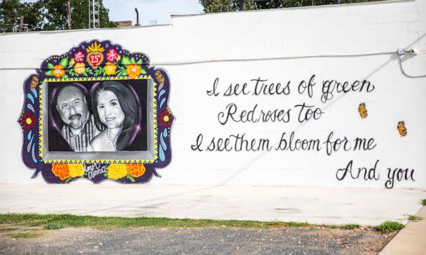 PHOTO: A mural in honor of Irma Garcia and Joe Garcia is seen on the wall of a building in downtown Uvalde, Texas, Aug. 21, 2022. (Kat Caulderwood/ABC News)