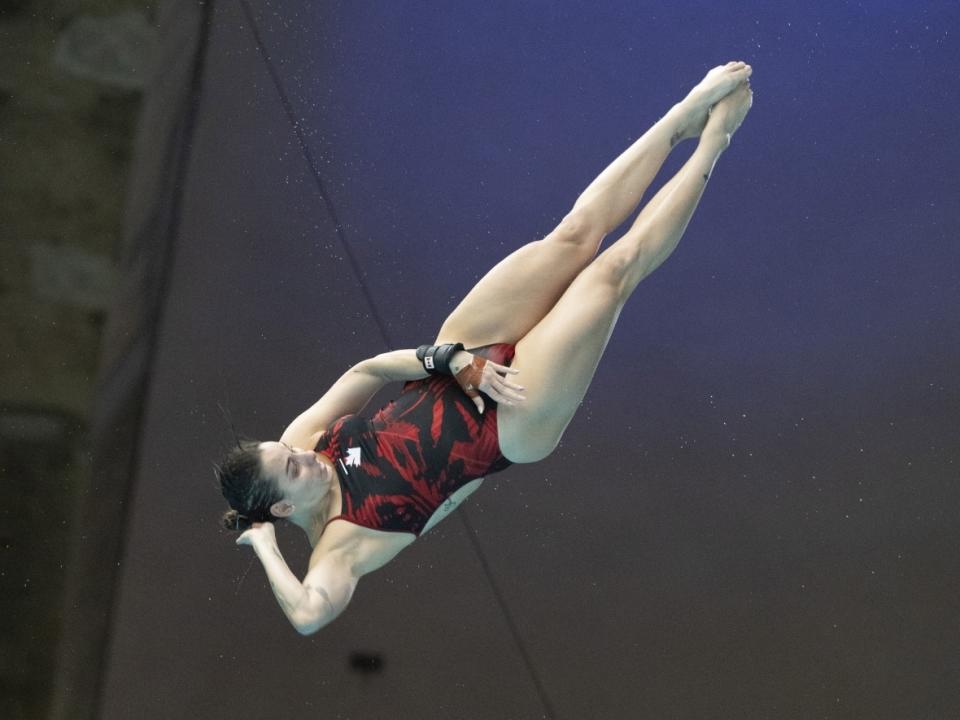 Pamela Ware of of Greenfield Park, Que., seen competing in Montreal in May, earned the Canadian title in the women's open platform 3-metre event at the summer national diving championships in Toronto on Sunday. (Christinne Muschi/The Canadian Press - image credit)