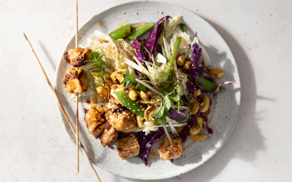 <p>Alison Ashton</p><p>This main dish salad combines elements of a Chinese chicken salad with loads of crunchy veggies and Thai-inspired satay skewers for one delicious mashup.</p><p><strong>Get the recipe:</strong> <a href="https://parade.com/1390329/alison-ashton/daphne-oz-asian-chopped-chicken-salad-with-sweet-chili-soy-dressing/" rel="nofollow noopener" target="_blank" data-ylk="slk:Asian Chicken Salad;elm:context_link;itc:0;sec:content-canvas" class="link ">Asian Chicken Salad</a></p>