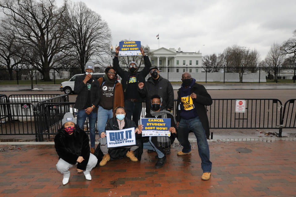 Organizers Brandi Williams, left, Aniyah Vines, Kevin Cramer, Nylik McMillian, Shakya Cherry-Donaldson, Wisdom Cole, the Rev. Lennox Yearwood Jr. and Terrence "TC" Muhammad rally in front of the White House in January to urge President Joe Biden to cancel student loan debt.