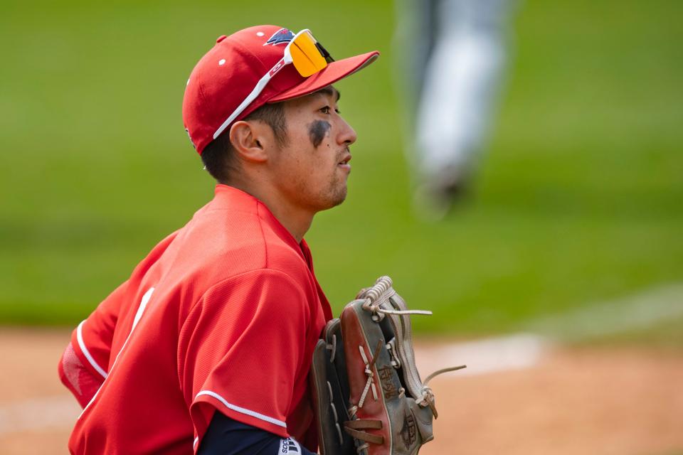 University of Southern Indiana’s Ren Tachioka (8) walks off the field after the Screaming Eagles strike out against the Southeast Missouri State University Redhawks during their game at the USI Baseball Field in Evansville, Ind., Saturday afternoon, April 8, 2023.