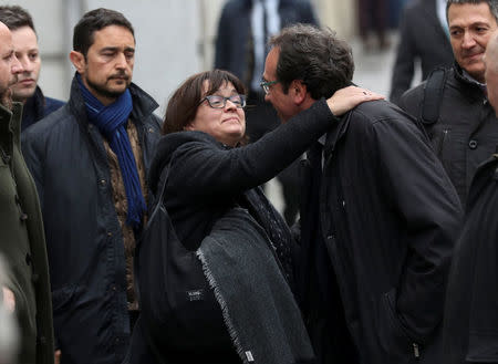 Catalan politician Josep Rull says goodbye to his wife Meritxell Lluis while returning to the Supreme Court during a break in proceedings as part of an investigation into Catalonia's banned bid for independence in Madrid, Spain, March 23, 2018. REUTERS/Susana Vera