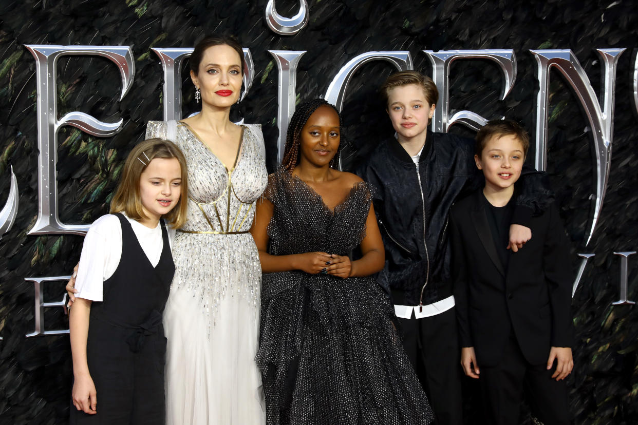 Angelina Jolie, pictured here with her children (L to R): Vivienne, Zahara, Shiloh, and Knox. (Photo: Tim P. Whitby/Getty Images)