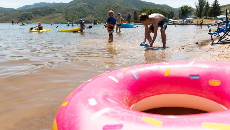 People play in the water at East Canyon State Park in Morgan on Monday, July 17, 2023.