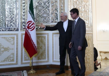 Iranian Foreign Minister Mohammad Javad Zarif welcomes Japanese Foreign Minister Taro Kono in Tehran