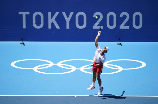 Novak Djokovic, seeking to become the first man in history to win a Golden Slam of all four grand slam titles and Olympic singles gold in the same year, trains in Tokyo (Mike Egerton/PA)