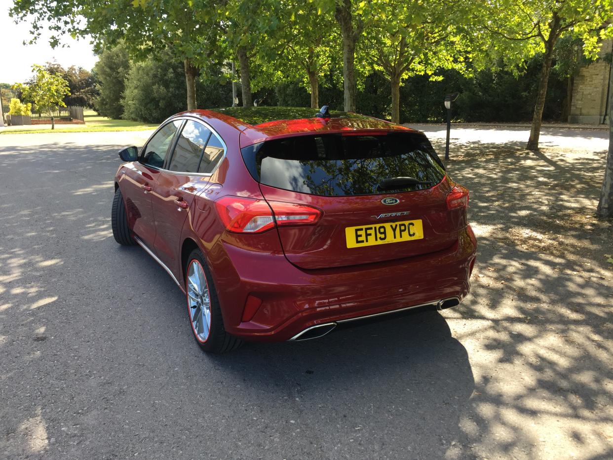 The rear of the car is sharply styled 