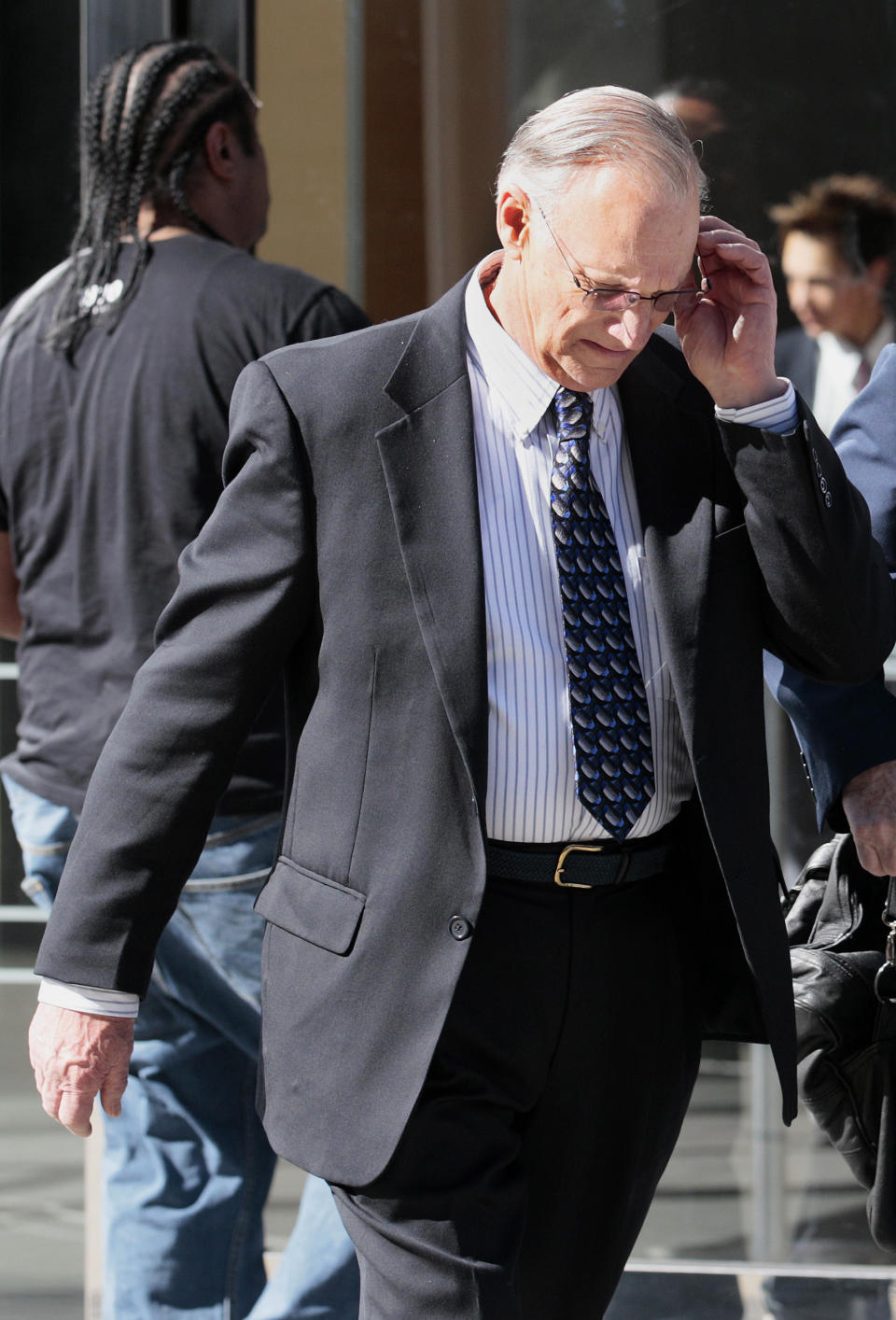 Robert Maegerle walks out of a federal courthouse in San Francisco, Thursday, March 8, 2012. Maegerle, a retired DuPont engineered accused of working with Walter Liew to illegally sell DuPont’s techonology to a company controlled by the Chinese government, pleaded not guilty to economic espionage charges. (AP Photo/Jeff Chiu)