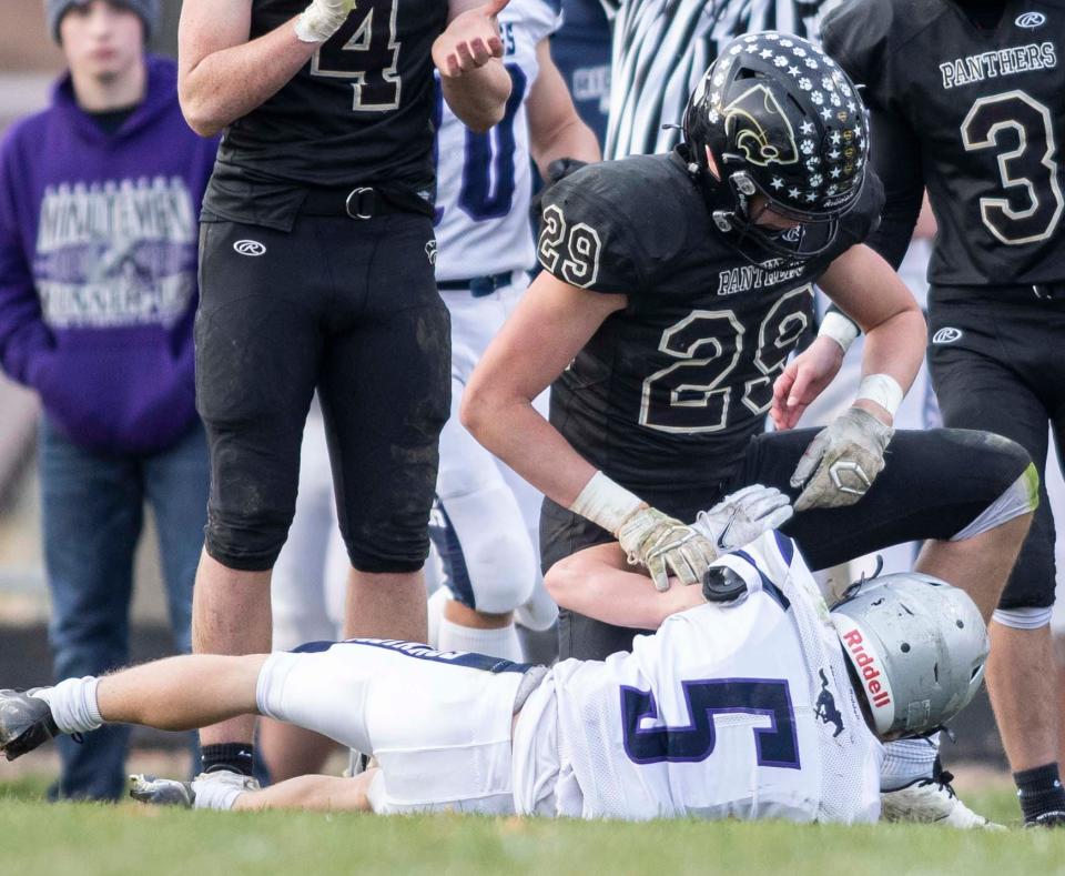 Brody Mahon, shown making a tackle against Colfax Ridgeview/Lexington in the Class 1A state semifinals on Saturday, Nov. 20, 2021, was the only Lena-Winslow player named all-state this year by the Illinois Football Coaches Association.