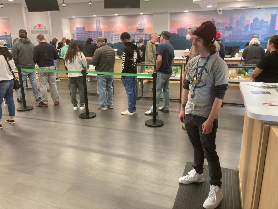 Jason, a budtender at Curaleaf in Bellmawr, N.J., stands ready to direct traffic on the busy sales floor in the weed store on Creek Road. A week after fun weed became legal in Jersey, business remained brisk with both medical and "adult use" cannibis.