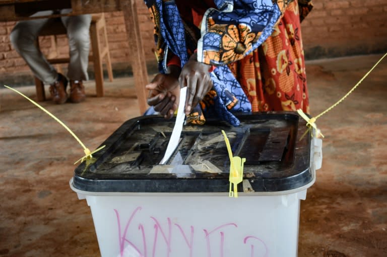 A woman casts her vote at a polling station in Ciri, northern Burundi, on May 17, 2018