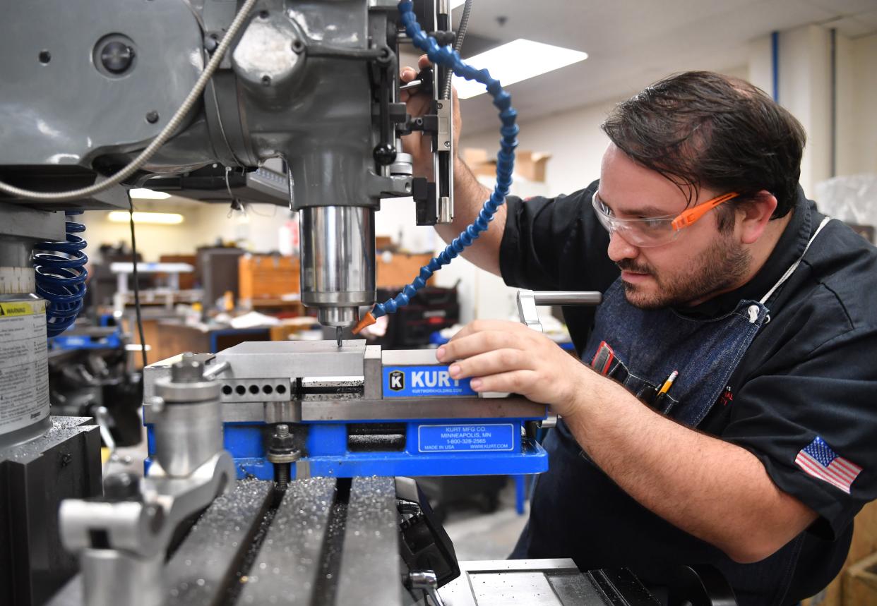 William Merriman, a third-year apprentice tool and die maker, manufactures a die for a custom beam for an aluminum window at PGT Innovations, a custom window and door manufacturer in Venice in Venice. Merriman had previously worked in the preventative maintenance department at PGTI.