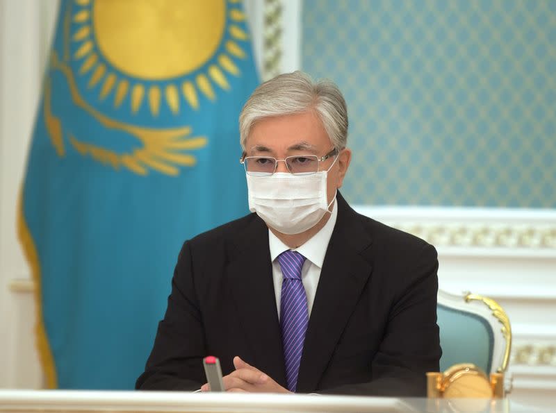 Kazakh President Kassym-Jomart Tokayev participates online in the unveiling ceremony of a monument to Nursultan Nazarbayev, in Nur-Sultan