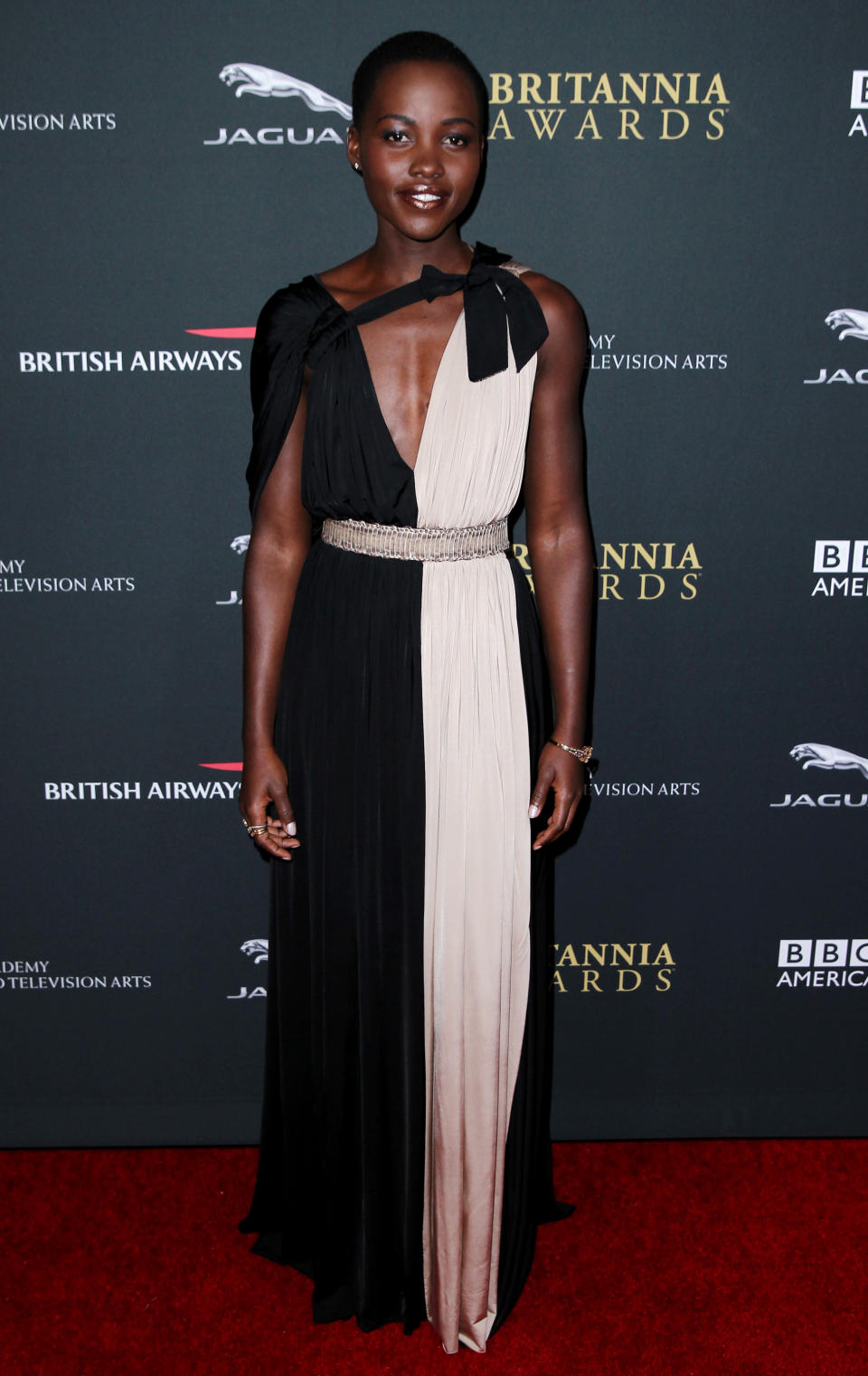 Lupita Nyong'o arrives at the 2013 BAFTA Los Angeles Britannia Awards at the Beverly Hilton Hotel on Saturday, Nov. 9, 2013 in Beverly Hills, Calif. (Photo by Matt Sayles/Invision/AP)