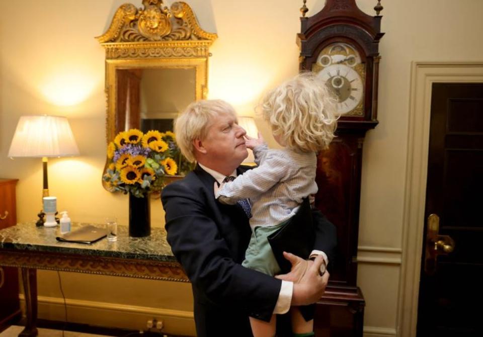 Mr Johnson doted on his two-year-old son and looked at him lovingly as he held him in his arms (No10 Flickr)