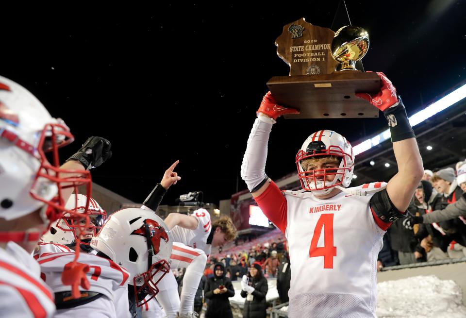 Kimberly's Ethan Doucette (4) celebrates the Papermakers’ 34-30 victory against Mukwonago during the WIAA Division 1 state championship game Friday at Camp Randall Stadium in Madison.