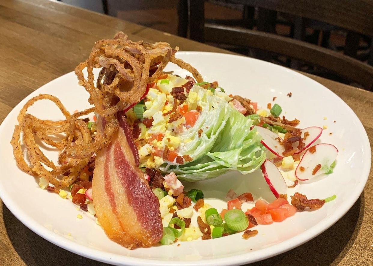 A wedge salad is among the items on the menu at Table 100 in Flowood.