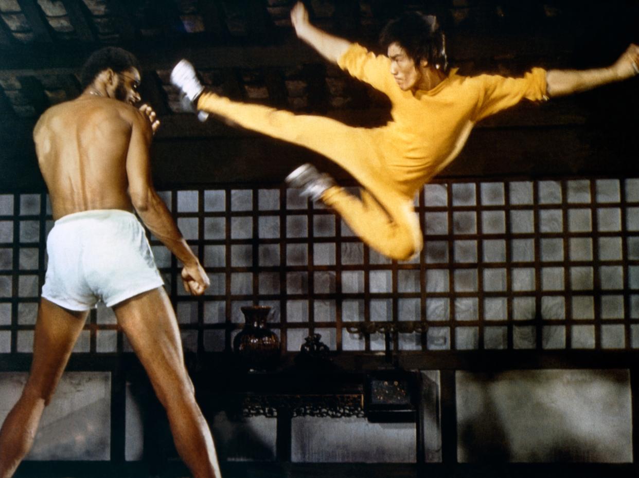 Kareem Abdul-Jabbar and Bruce Lee on the set of "Game of Death." (Photo: Sunset Boulevard via Corbis via Getty Images)