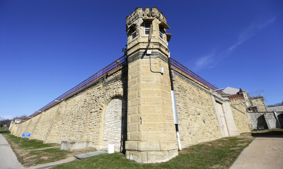 This Monday, Nov. 18, 2013, photo shows a guard tower at the Iowa State Penitentiary in Fort Madison, Iowa. The penitentiary, the oldest in use west of the Mississippi River with a history dating back to 1839, is set to close when a $130 million replacement opens down the road next year. (AP Photo/Charlie Neibergall)