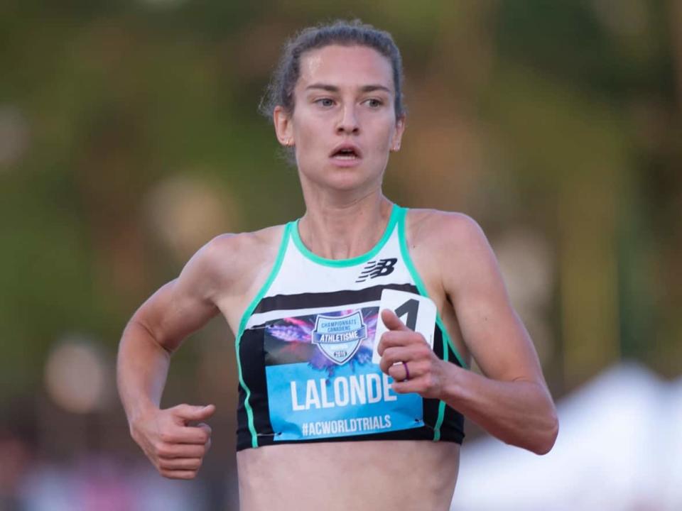 Genevieve Lalonde, shown in this 2019 file photo, claimed her third cross-country national title on Saturday in Ottawa. John Gay took the men's title. (File/The Canadian Press - image credit)