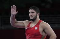 FILE - Russian Olympic Commitee's Abdulrashid Sadulaev celebrates after defeating United State's Kyle Frederick Snyder during their men's freestyle 97kg wrestling final match at the 2020 Summer Olympics, Saturday, Aug. 7, 2021, in Chiba, Japan. (AP Photo/Aaron Favila, File)