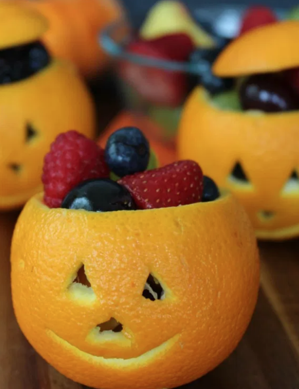 <p>Frugal Coupon Living</p><p>Orange pumpkin cups made with fruit: A healthy fall treat idea. Serve these jack-o' lantern oranges at your next Halloween party!</p><p><strong>Get the recipe: <a href="https://www.frugalcouponliving.com/orange-jack-o-lantern-cups/" rel="nofollow noopener" target="_blank" data-ylk="slk:Orange Jack-O'-Lantern Fruit Cups;elm:context_link;itc:0;sec:content-canvas" class="link ">Orange Jack-O'-Lantern Fruit Cups</a></strong></p>