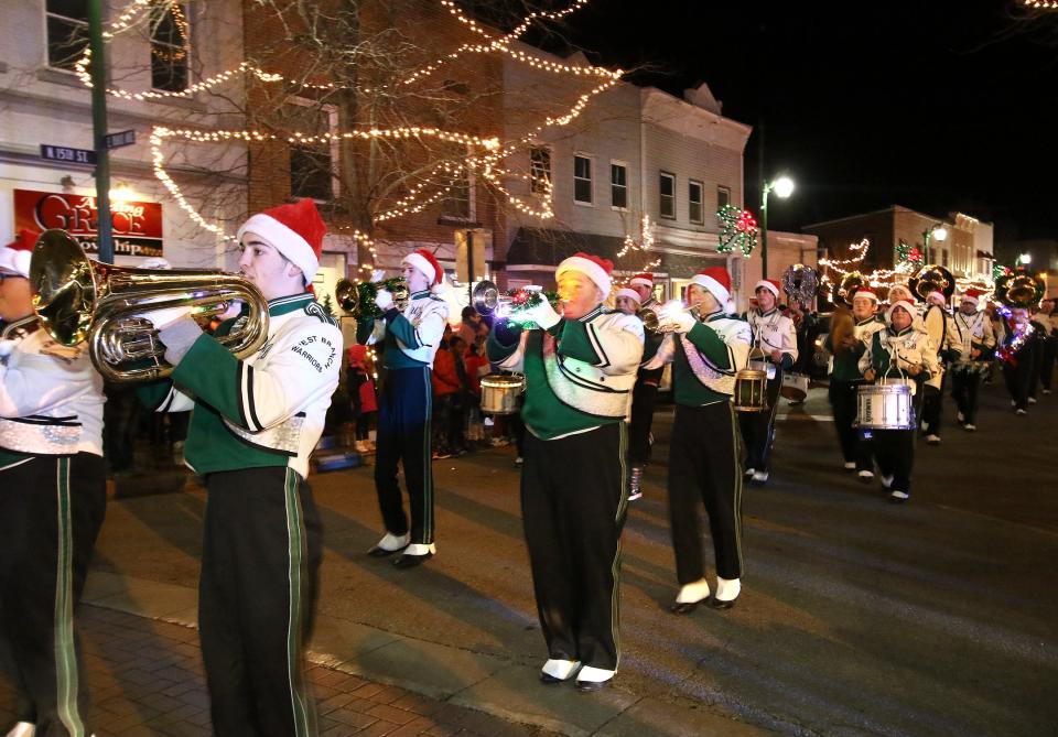 West Branch's marching band performs on 15th Street on Saturday, Dec. 4, 2021, during the Sebring Christmas in the Village event.