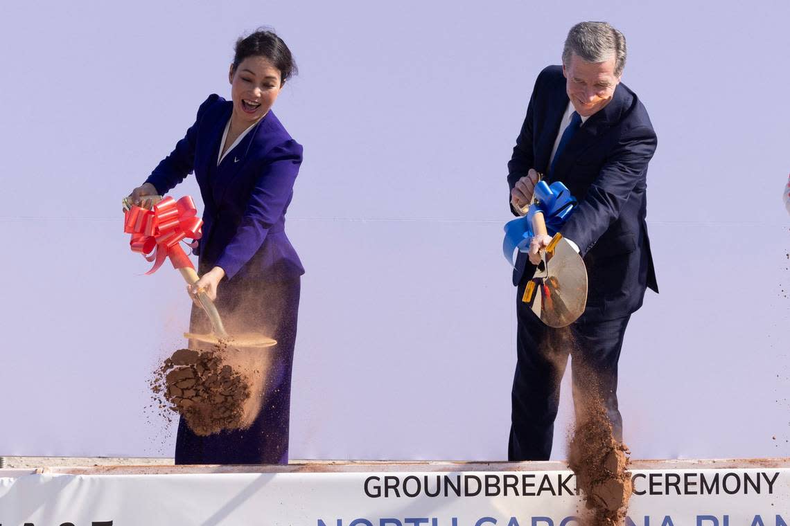 VinFast CEO Le Thi Thu Thuy and Gov. Roy Cooper participate in a a groundbreaking ceremony Friday, July 28, 2003 at the future site of a Vinfast plant in Moncure. Travis Long/tlong@newsobserver.com