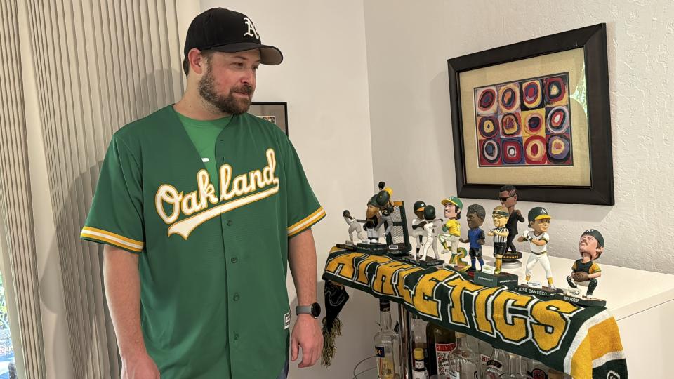 Ken Rettberg, a longtime Oakland A’s fan, is frustrated by the baseball team’s planned departure for Las Vegas and the taxpayer dollars that are subsidizing new sports venues. Pleasant Hill, Calif. Dec. 19, 2023. (AP Photo/Terry Chea)