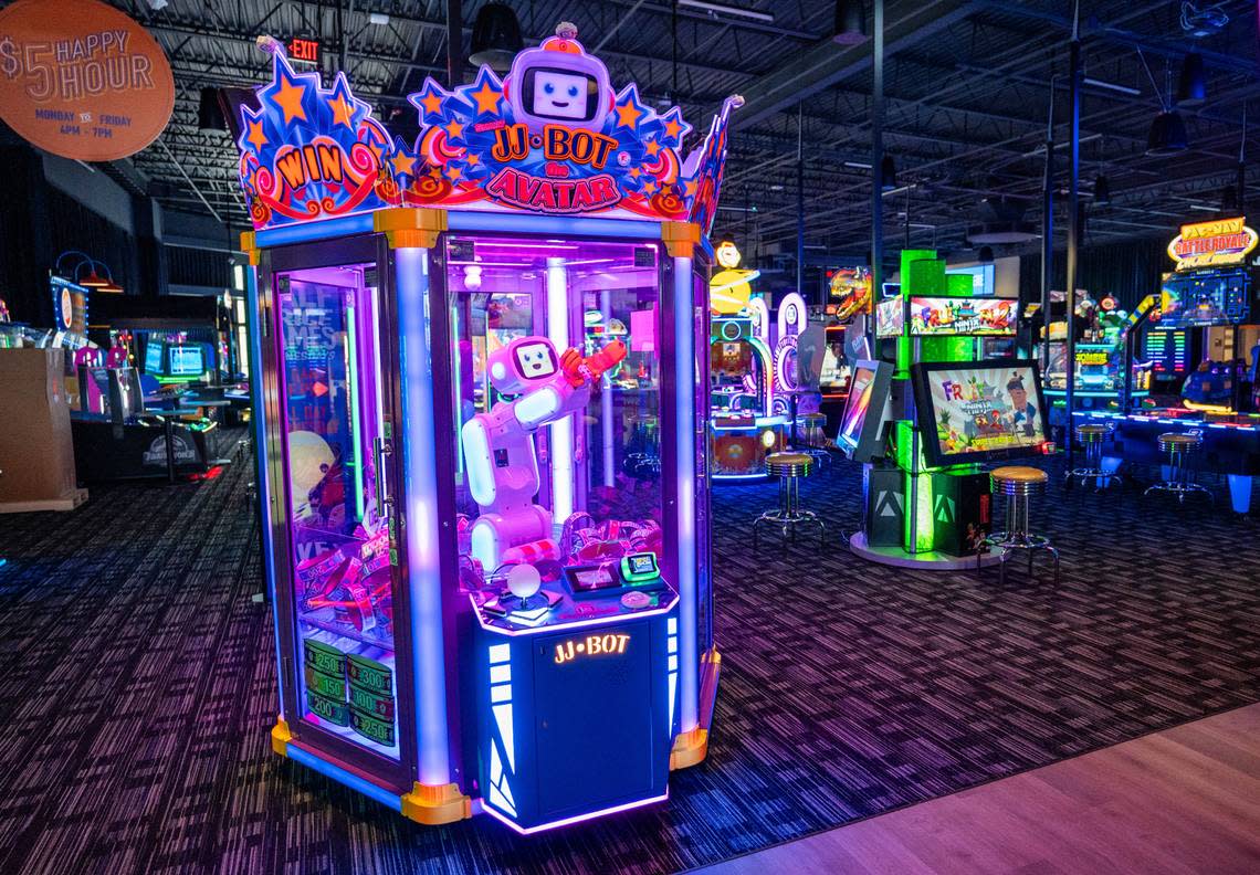 A variety of arcade games are spread throughout the back area of Dave & Buster’s in Folsom on Tuesday, March 26, 2024. Cameron Clark/cclark@sacbee.com