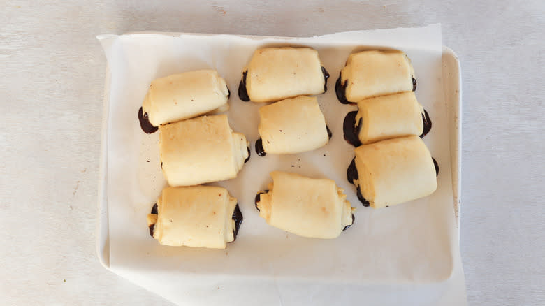 pain au chocolat risen on baking sheet