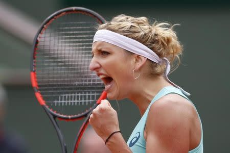 Tennis - French Open - Roland Garros - Eugenie Bouchard of Canada vs Timea Bacsinszky of Switzerland. - Paris, France - 26/05/16. Timea Bacsinsky reacts. REUTERS/Pascal Rossignol