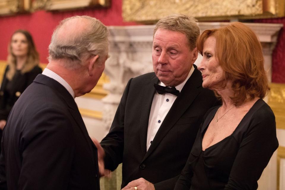 Happy couple: Harry Redknapp and his wife Sandra meeting The Prince of Wales last year (John Phillips/PA)