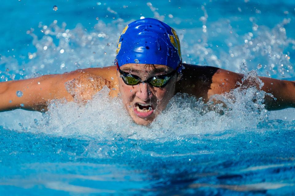 John Carroll's Gabe Guglietta competes in the boys 100 Yard Butterfly during the swimming and diving District 6-1A championship on Wednesday, Oct. 26, 2022, at Indian River State College in Fort Pierce.
