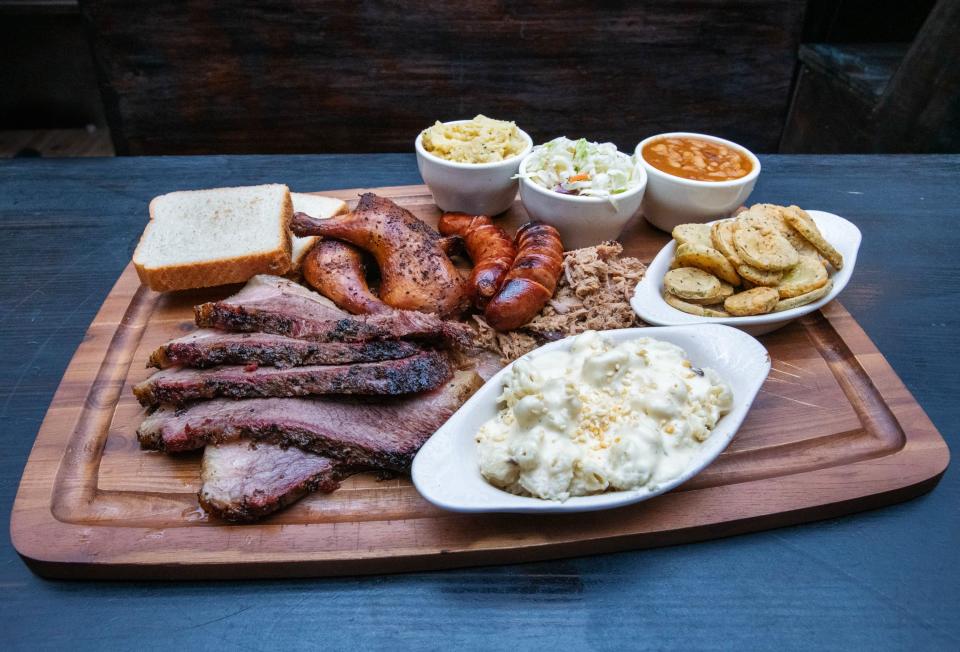 A Pursuit of Meat Sweats platter at the Pensacola Smokehouse in downtown Pensacola on Friday, Feb. 10, 2023.