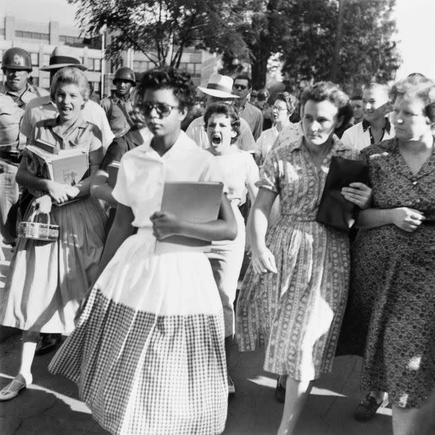 Elizabeth Eckford ignores the screams and stares of fellow students on her first day of school, Sept. 6, 1957. She was one of the nine African-American students whose integration into Central High School in Little Rock, Arkansas, was ordered by a federal court following legal action by the National Association for the Advancement of Colored People. (Photo: Bettmann via Getty Images)