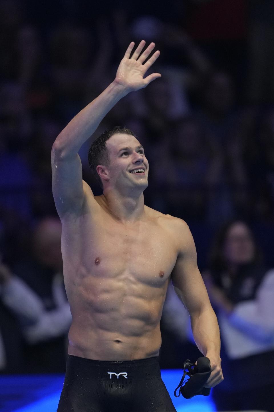 Nic Fink reacts after winning the Men's 100 breaststroke finals Sunday, June 16, 2024, at the US Swimming Olympic Trials in Indianapolis. (AP Photo/Michael Conroy)