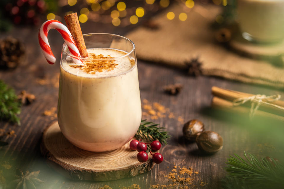 eggnog with a candy cane in it